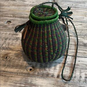 New, never used, hand woven crossbody bag with leather shoulder strap & tassels